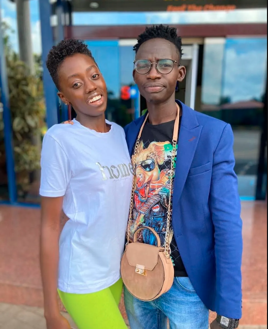 MCA Tricky carrying Akothee's daughter Rue Baby's handbag