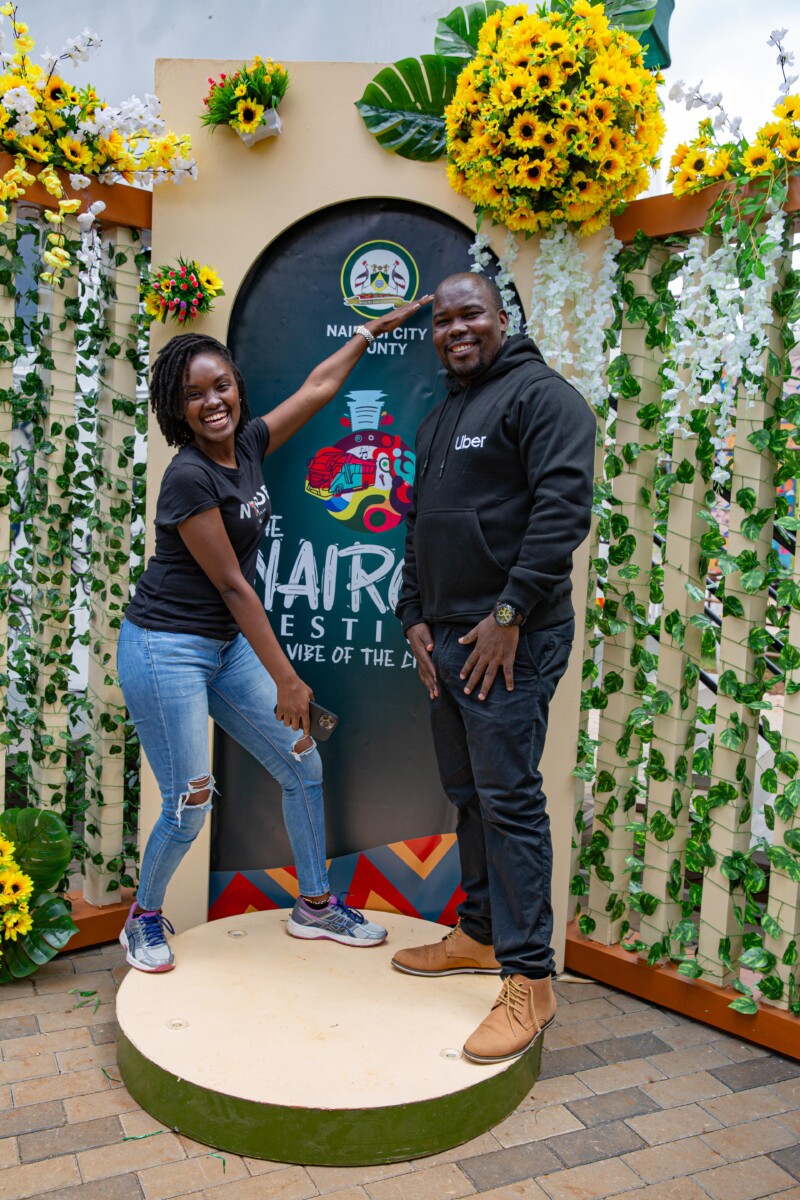 (L-R) Nairobi County CEC Suzanne Silantoi welcomes Uber Sales and Marketing Coordinator Chacha Maroa to Nairobi Festival at Uhuru Park.
