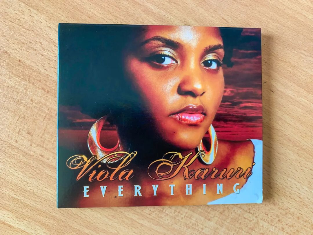 Viola Karuri showing her physical copy of her debut studio album dubbed 'Everything' which was officially dropped in 2008. She says this album opened doors for him not only in Kenya but across the East African region, especially Tanzania. Photo credit: Instagram/violakaruri