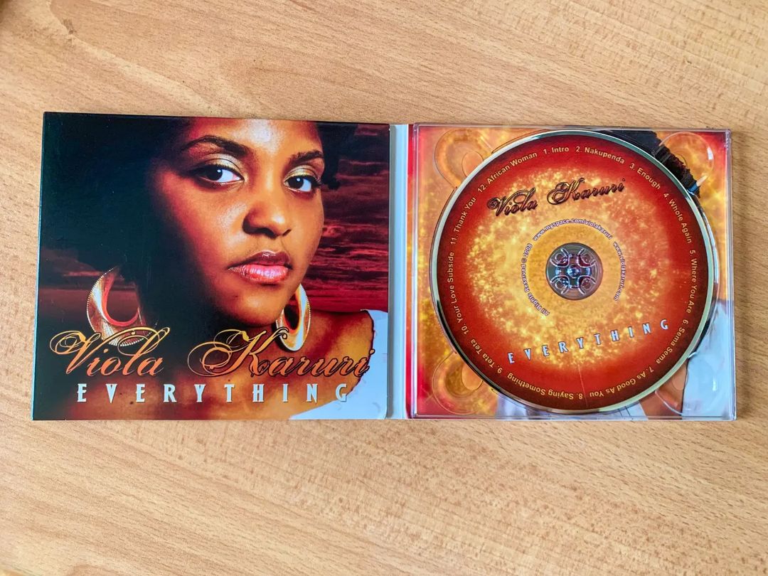 Viola Karuri showing her physical copy of her debut studio album dubbed 'Everything' which was officially dropped in 2008. She says this album opened doors for him not only in Kenya but across the East African region, especially Tanzania. Photo credit: Instagram/violakaruri