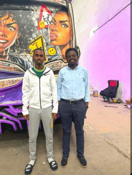 George Ruto [right] standing next to his matatu 'Mood' before its launch. PHOTO/X/@Nganya_Reviews