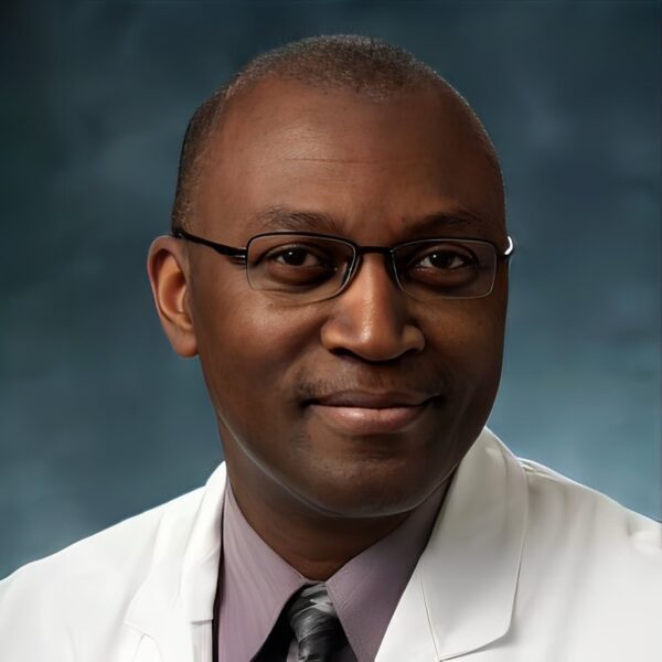 Dr. Oluyinka Olutoye poses with the parents and the baby he operated on. PHOTO/X/@Afrika_Stories