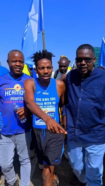 Eric Omondi is escorted by comedian Daniel Ndambukia aka Churchill as he treks from Nairobi to Mombasa. 